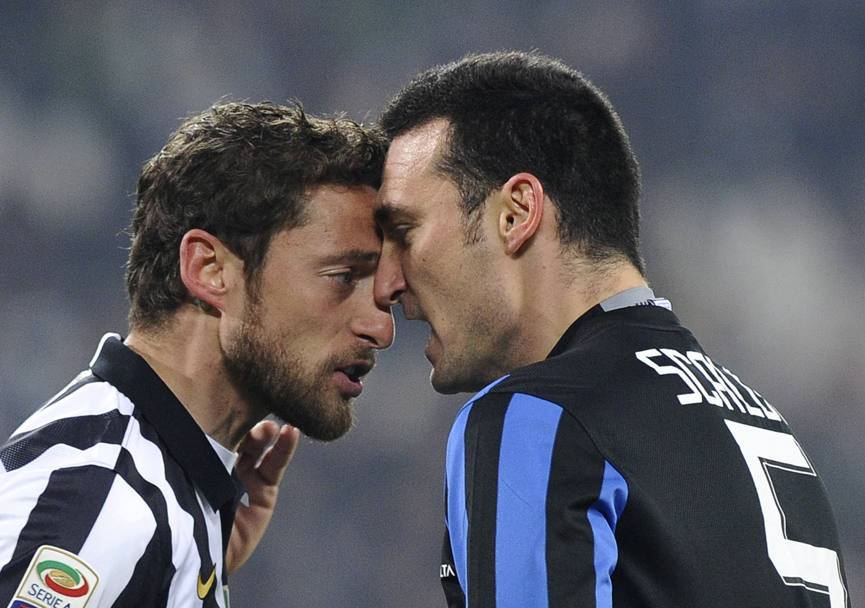 Testa contro testa tra Marchisio e Scaloni. Reuters